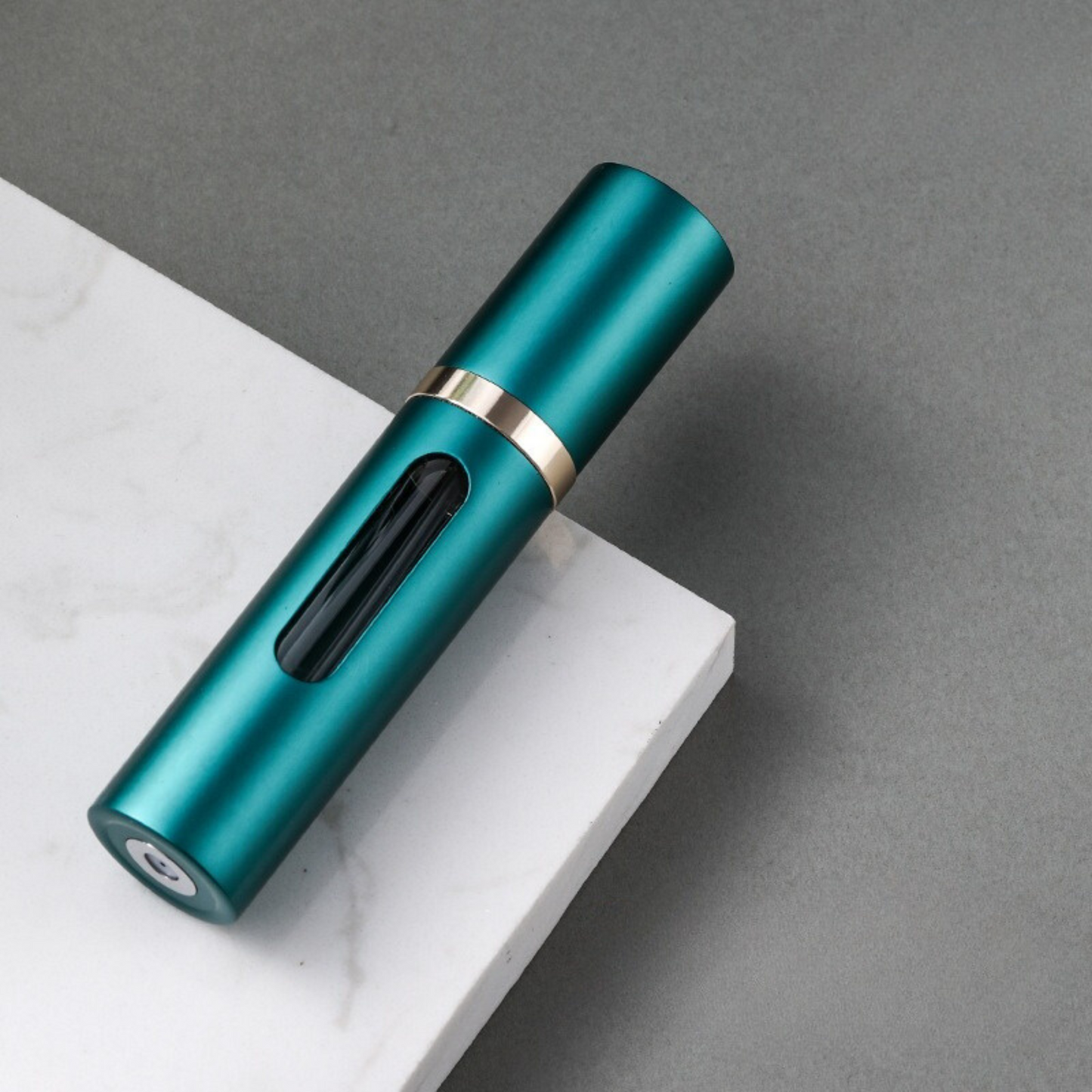 Porta profumo da viaggio verde acqua, elegante e facile da riempire